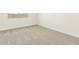 Neutral bedroom with carpet and a window for natural light at 19406 N Fiano Dr, Maricopa, AZ 85138