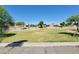 Well-maintained community park offering green space and walking paths at 19406 N Fiano Dr, Maricopa, AZ 85138