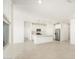 Open concept kitchen with stainless steel appliances and a large center island at 19406 N Fiano Dr, Maricopa, AZ 85138