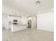 Modern kitchen with a large island, stainless steel appliances, and ample storage at 19406 N Fiano Dr, Maricopa, AZ 85138