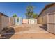 Backyard with several storage sheds at 19407 N 15Th Ave, Phoenix, AZ 85027