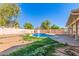 Tranquil backyard with refreshing pool and desert landscaping at 19407 N 15Th Ave, Phoenix, AZ 85027