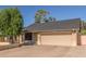 Charming single-story home with a two-car garage, neutral colors, and mature landscaping at 19407 N 15Th Ave, Phoenix, AZ 85027