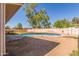 Backyard view of a refreshing pool and desert landscaping at 19407 N 15Th Ave, Phoenix, AZ 85027