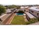 Aerial view of a large backyard with a pool and grassy area at 2109 W Wildhorse Dr, Chandler, AZ 85286