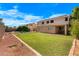 The backyard features a pool, lush lawn, and convenient access to outdoor amenities at 2109 W Wildhorse Dr, Chandler, AZ 85286