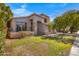 Beautifully landscaped home with a spacious lawn and charming curb appeal at 2109 W Wildhorse Dr, Chandler, AZ 85286
