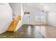 Bright living room features vaulted ceilings, large windows, and a staircase at 2109 W Wildhorse Dr, Chandler, AZ 85286