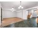 Open floor plan with tile and wood floors, connecting to other living spaces at 2109 W Wildhorse Dr, Chandler, AZ 85286