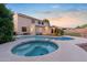 Backyard pool features a spa and a deck for entertaining at 2109 W Wildhorse Dr, Chandler, AZ 85286