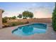 Inviting pool surrounded by lush landscaping, ideal for relaxing and entertaining at 2109 W Wildhorse Dr, Chandler, AZ 85286