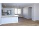Open kitchen featuring stainless appliances, white cabinets, and modern countertops at 21433 E Calle De Flores Ct, Queen Creek, AZ 85142