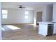 Open-concept living area featuring new wood flooring and plenty of natural light at 21433 E Calle De Flores Ct, Queen Creek, AZ 85142