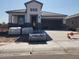 New single-story home under construction featuring a neutral color scheme and tile roof at 2317 S 125Th Dr, Avondale, AZ 85323