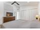 Bright bedroom featuring an open doorway, lots of closet space, and an artistic decor piece at 2946 N 14Th St # 3, Phoenix, AZ 85014