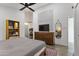 Bright bedroom featuring an open doorway, high ceilings, and an artistic decor piece at 2946 N 14Th St # 3, Phoenix, AZ 85014