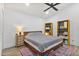Spacious bedroom with vaulted ceilings, ceiling fan, and decorative furnishings at 2946 N 14Th St # 3, Phoenix, AZ 85014
