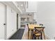 Bright dining area with seating for four, and open access to kitchen at 2946 N 14Th St # 3, Phoenix, AZ 85014
