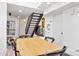 Comfortable dining room with a wooden table and a staircase, providing ample space at 2946 N 14Th St # 3, Phoenix, AZ 85014