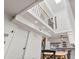 Open dining area with skylight and railing and adjacent to a well-equipped kitchen at 2946 N 14Th St # 3, Phoenix, AZ 85014