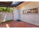 Private patio featuring secure door entry and block wall boundaries at 2946 N 14Th St # 3, Phoenix, AZ 85014