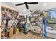 Multipurpose storage room with window, filled with bikes, storage shelves, and equipment at 2946 N 14Th St # 3, Phoenix, AZ 85014