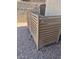 AC unit enclosure featuring horizontal slats and gravel surround for a clean, modern look at 3064 E Michelle Way, Gilbert, AZ 85234