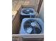 AC units hidden by decorative enclosure for a tidy and aesthetically pleasing backyard at 3064 E Michelle Way, Gilbert, AZ 85234