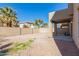 Backyard with desert landscaping and a covered patio at 3064 E Michelle Way, Gilbert, AZ 85234
