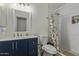 Bright bathroom with updated vanity, mirror and walk-in shower at 3064 E Michelle Way, Gilbert, AZ 85234