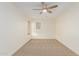 Bedroom with carpet, light walls, a ceiling fan, and a window at 3064 E Michelle Way, Gilbert, AZ 85234