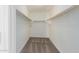 Walk-in closet featuring carpet and wooden racks at 3064 E Michelle Way, Gilbert, AZ 85234