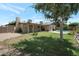 Large backyard with mature tree and grass area overlooking the pool at 3227 W Kristal Way, Phoenix, AZ 85027
