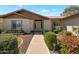 Charming single-story home featuring a well-maintained front yard with mature landscaping and a welcoming entrance at 3227 W Kristal Way, Phoenix, AZ 85027