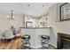 The kitchen and dining area features updated lighting, flooring and stainless appliances at 3633 N 3Rd Ave -- # 1035, Phoenix, AZ 85013