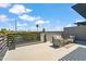 Spacious rooftop deck features comfortable seating, greenery, and panoramic views at 377 E Windsor Ave # 24, Phoenix, AZ 85004