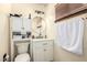 Bathroom featuring vanity with medicine cabinet and a decorative towel hanger at 3842 W Ocotillo Rd, Phoenix, AZ 85019