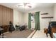 This room features an acoustic wall, musical instruments, neutral paint and decor and lots of floor space at 3842 W Ocotillo Rd, Phoenix, AZ 85019