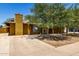 Charming single-story home with mature trees providing shade in the front yard and long driveway at 3842 W Ocotillo Rd, Phoenix, AZ 85019