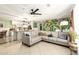 Inviting living room featuring a comfortable sectional sofa and an open layout to the kitchen at 3842 W Ocotillo Rd, Phoenix, AZ 85019