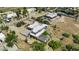 Aerial view of the home in the community with desert landscaping and an enclosed pool area at 38709 N 16Th Pl, Phoenix, AZ 85086