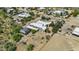 Overhead view of the home, desert landscaping and a private enclosed pool area at 38709 N 16Th Pl, Phoenix, AZ 85086