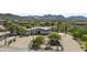 Stunning aerial view of a custom home with desert landscaping and mountain views at 38709 N 16Th Pl, Phoenix, AZ 85086