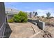 View of desert landscaped backyard with lush plants and the stucco exterior of the home at 38709 N 16Th Pl, Phoenix, AZ 85086