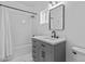Bathroom with stylish vanity, matte black fixtures and shower at 38709 N 16Th Pl, Phoenix, AZ 85086