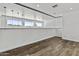 Bonus room with vinyl flooring and large windows at 38709 N 16Th Pl, Phoenix, AZ 85086