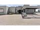Modern home with a porte-cochere and desert landscaping at 38709 N 16Th Pl, Phoenix, AZ 85086