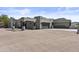 Contemporary home with desert landscaping and a spacious driveway at 38709 N 16Th Pl, Phoenix, AZ 85086
