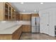 Bright kitchen with stainless steel appliances, hardwood floors, and ample countertop space at 38709 N 16Th Pl, Phoenix, AZ 85086