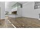 Open floor plan with hard wood floors, high ceilings, and stairs to the second floor at 38709 N 16Th Pl, Phoenix, AZ 85086